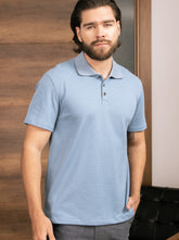 Polo tejida azul claro